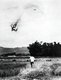 Vietnam: A USAF F-105 warplane is shot down near Vinh Phuc, North Vietnam, in September 1966. The pilot can be seen parachuting to safety - and captivity